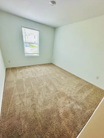 an empty room with a workbench