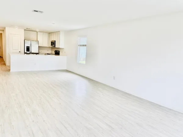 a view of a kitchen with a sink