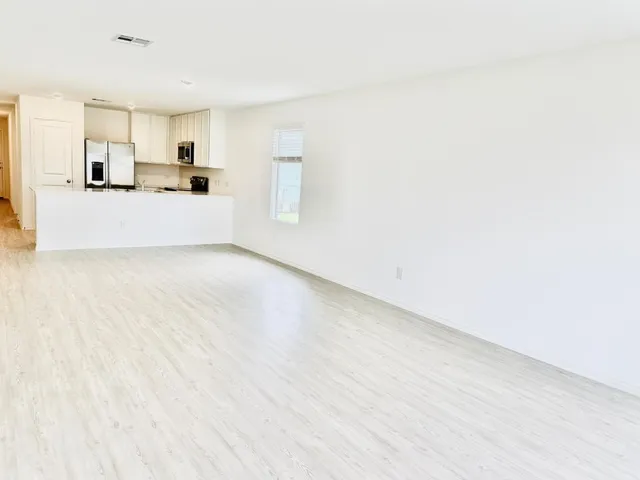 a view of a kitchen with a sink