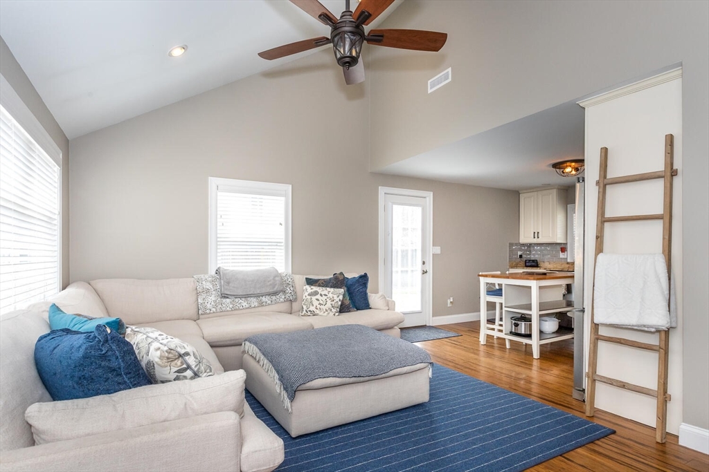 71 Highland Street Canton, MA 02021 - Photo 4 of 12 a living room with furniture wooden floor and a window