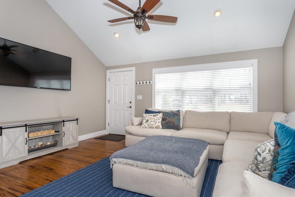 71 Highland Street Canton, MA 02021 - Photo 5 of 12 a living room with furniture and a flat screen tv