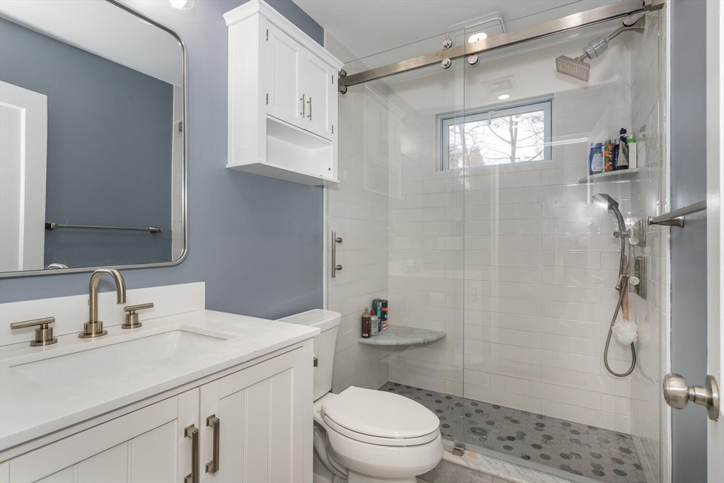 71 Highland Street Canton, MA 02021 - Photo 9 of 12 a bathroom with a sink toilet and shower