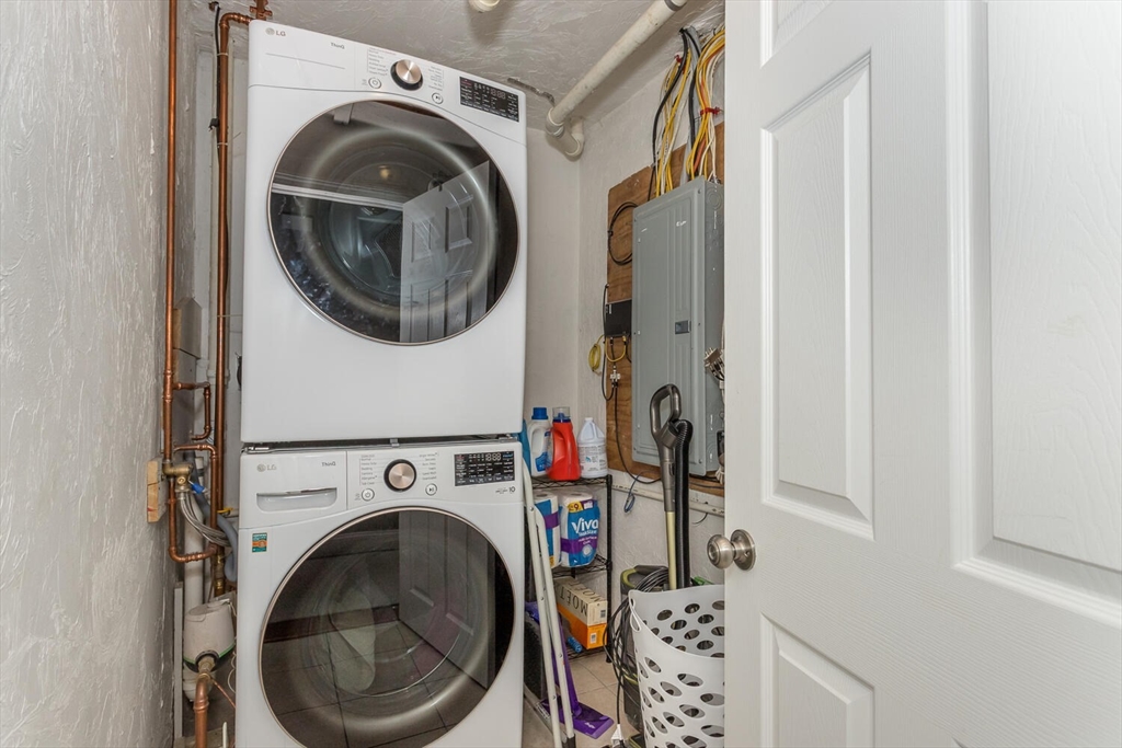 71 Highland Street Canton, MA 02021 - Photo 10 of 12 a view of a storage and utility room with washer and dryer