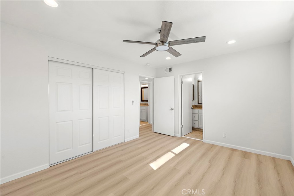 33771 Copper Lantern Street Dana Point, CA 92629 - Photo 12 of 16 a view of empty room with wooden floor and ceiling fan