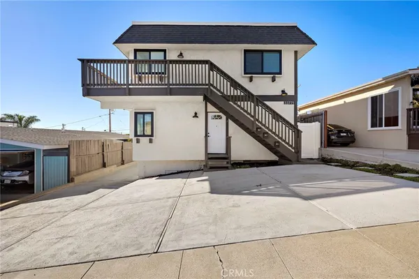 a front view of a house with garage