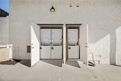 a view of a hallway with staircase