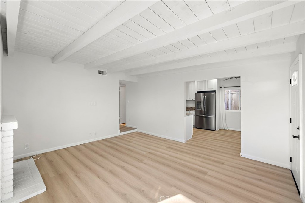 33771 Copper Lantern Street Dana Point, CA 92629 - Photo 4 of 16 a view of empty room with wooden floor