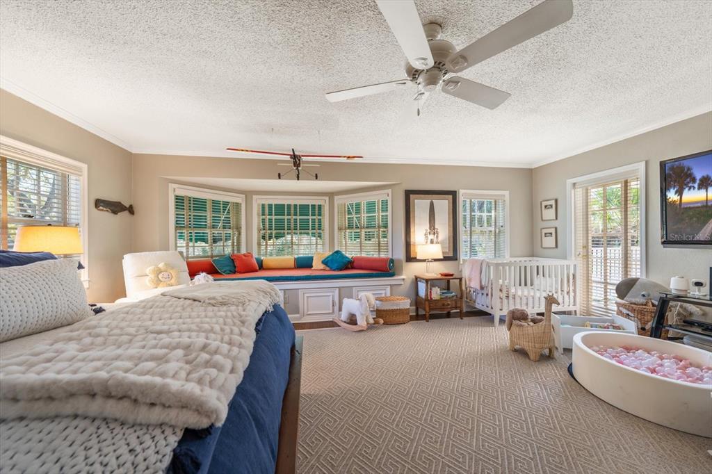 100 Sarasota Road Belleair, FL 33756 - Photo 37 of 75 a living room with furniture and a large window