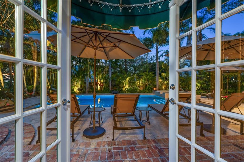 100 Sarasota Road Belleair, FL 33756 - Photo 45 of 75 a view of an outdoor sitting area with furniture