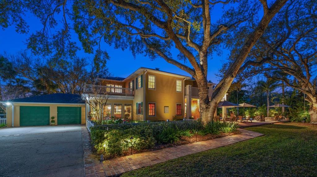 100 Sarasota Road Belleair, FL 33756 - Photo 54 of 75 a front view of a house with a yard