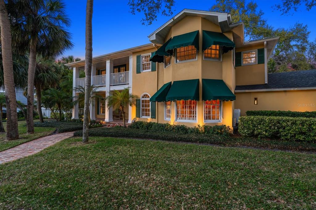 100 Sarasota Road Belleair, FL 33756 - Photo 61 of 75 a view of a house with a yard