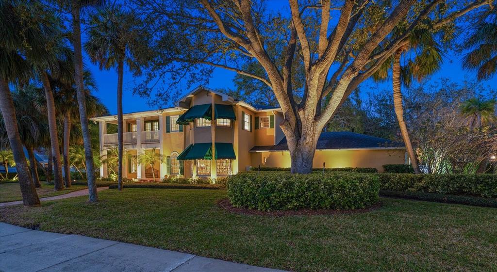 100 Sarasota Road Belleair, FL 33756 - Photo 65 of 75 a view of a house with a yard