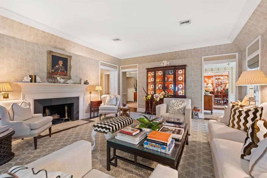 100 Sarasota Road Belleair, FL 33756 - Photo 10 of 75 a living room with furniture and a fireplace