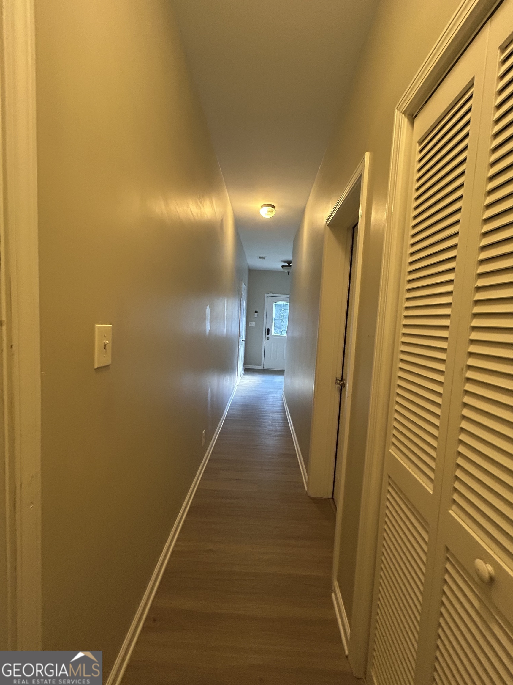 3086 Lauren Parc Road Decatur, GA 30032 - Photo 4 of 5 a view of gallery with wooden floor