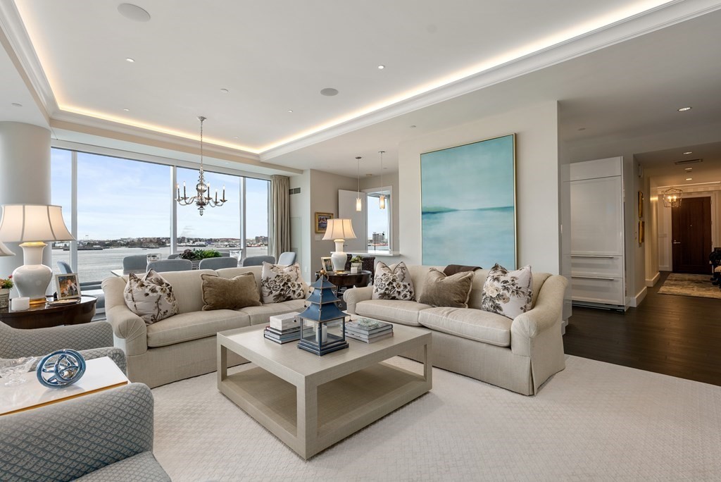 22 Liberty Drive, Unit 6A Boston, MA 02210 - Photo 2 of 42 a living room with furniture and a large window