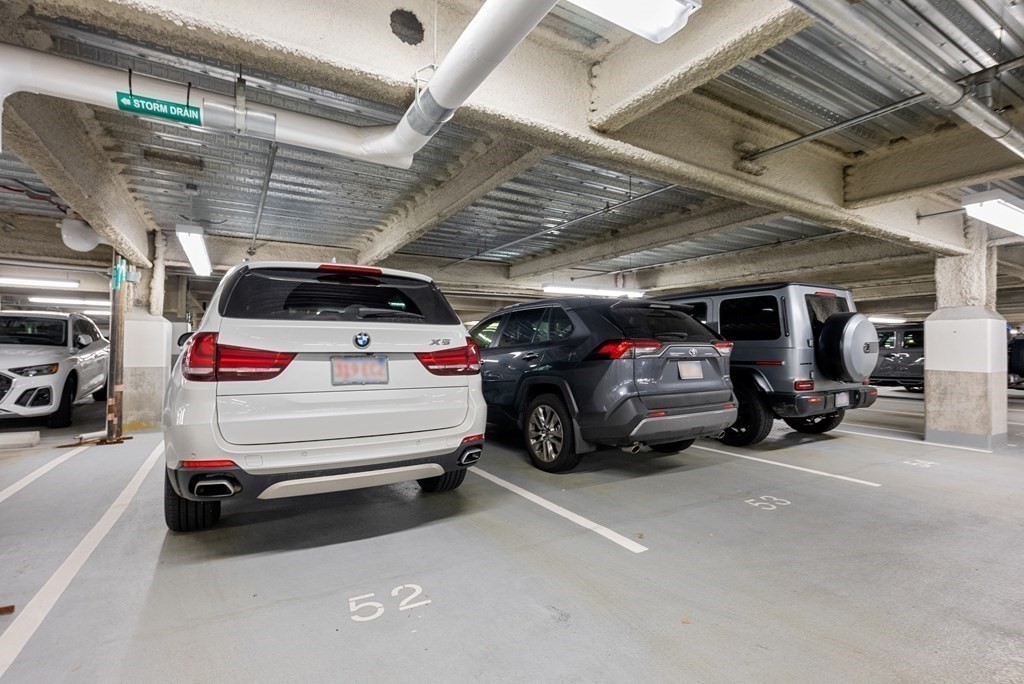 22 Liberty Drive, Unit 6A Boston, MA 02210 - Photo 30 of 42 a view of parking garage with cars parked