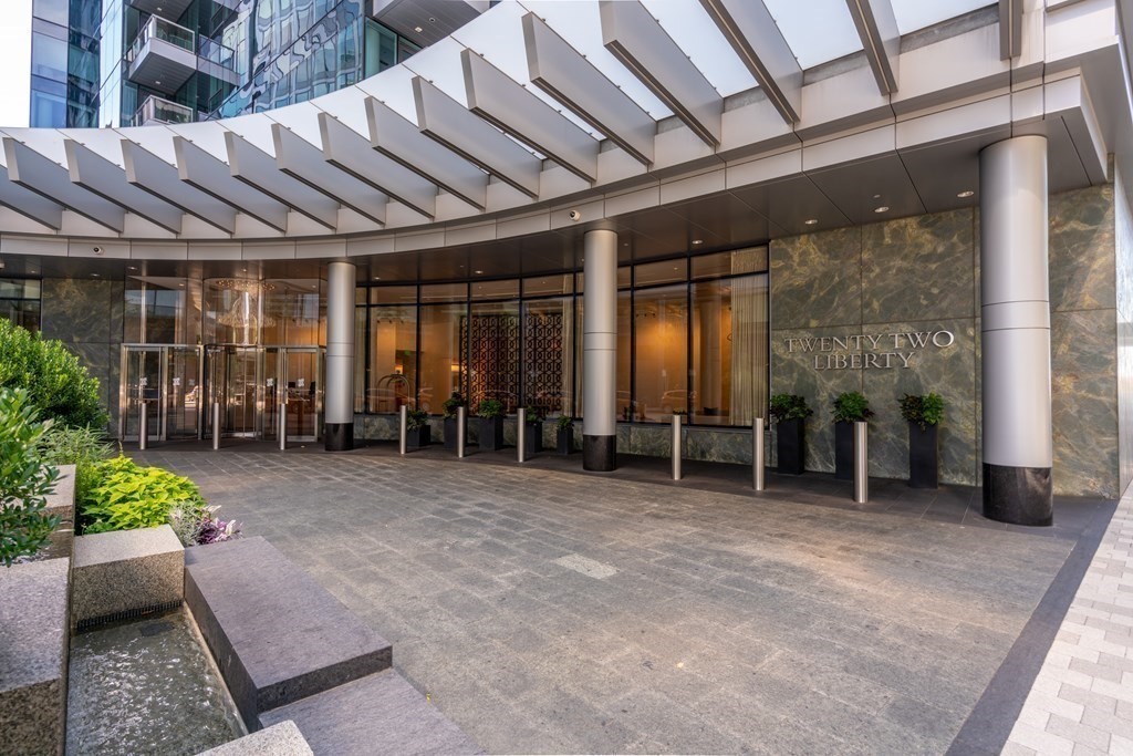 22 Liberty Drive, Unit 6A Boston, MA 02210 - Photo 33 of 42 a view of a porch with furniture and a yard