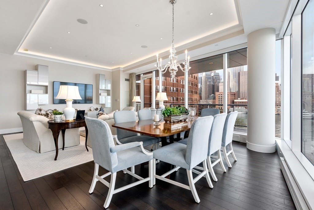 22 Liberty Drive, Unit 6A Boston, MA 02210 - Photo 5 of 42 a view of a dining room with furniture window and wooden floor