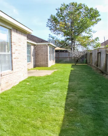 a view of a backyard with a garden