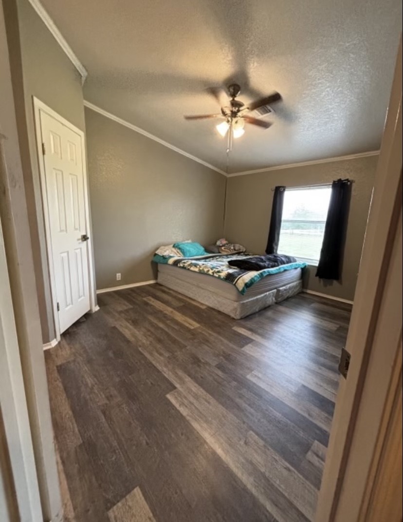 4021 Baker Road Needville, TX 77461 - Photo 6 of 14 a view of room with wooden floor and ceiling fan