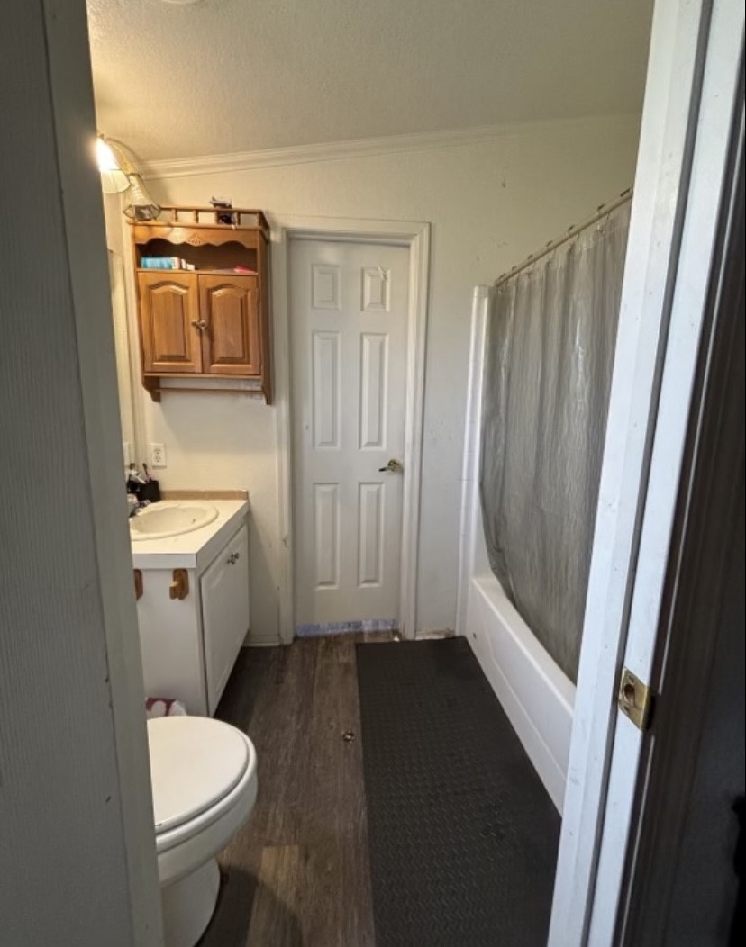 4021 Baker Road Needville, TX 77461 - Photo 10 of 14 a bathroom with a sink a toilet and shower