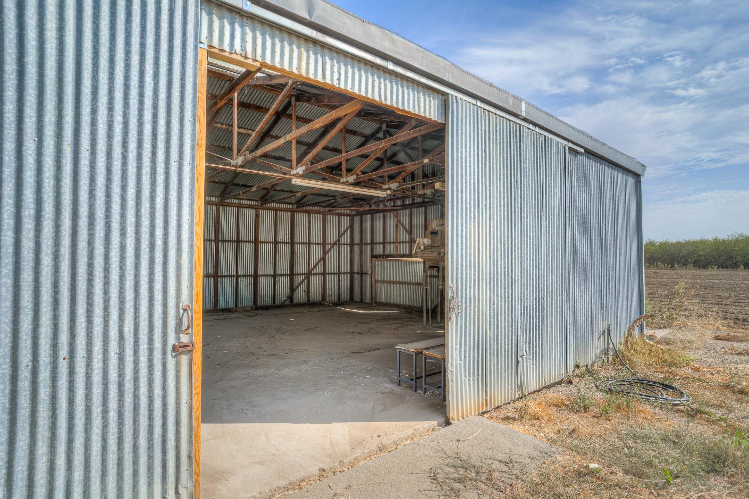 5463 Hankins Road Williams, CA 95987 - Photo 42 of 62 a view of a house with a door and wooden walls