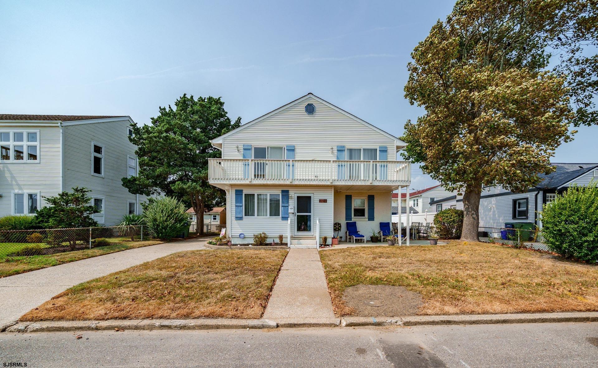 205 East Plaza Place Egg Harbor Township, NJ 08232 - Photo 2 of 31 a front view of a house with a yard