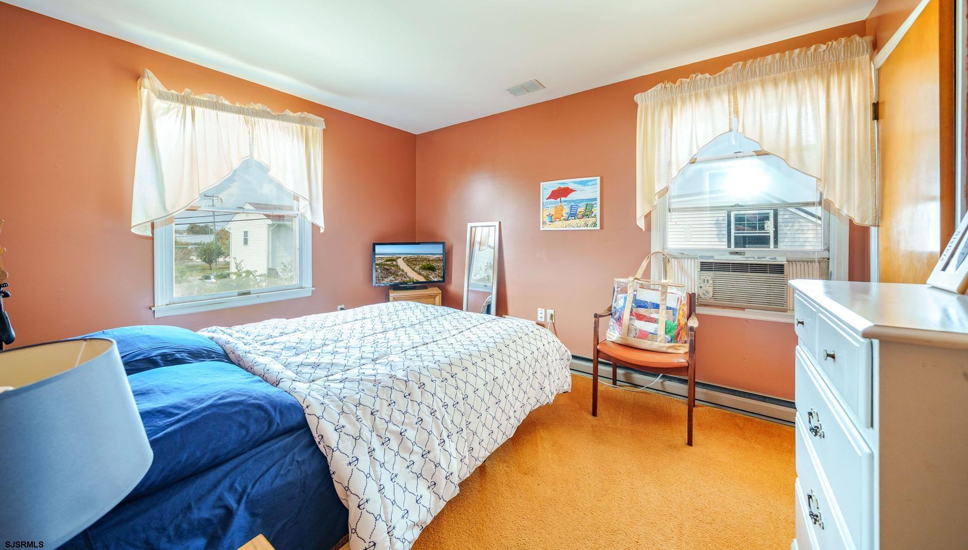 205 East Plaza Place Egg Harbor Township, NJ 08232 - Photo 24 of 31 a bedroom with a bed and a window