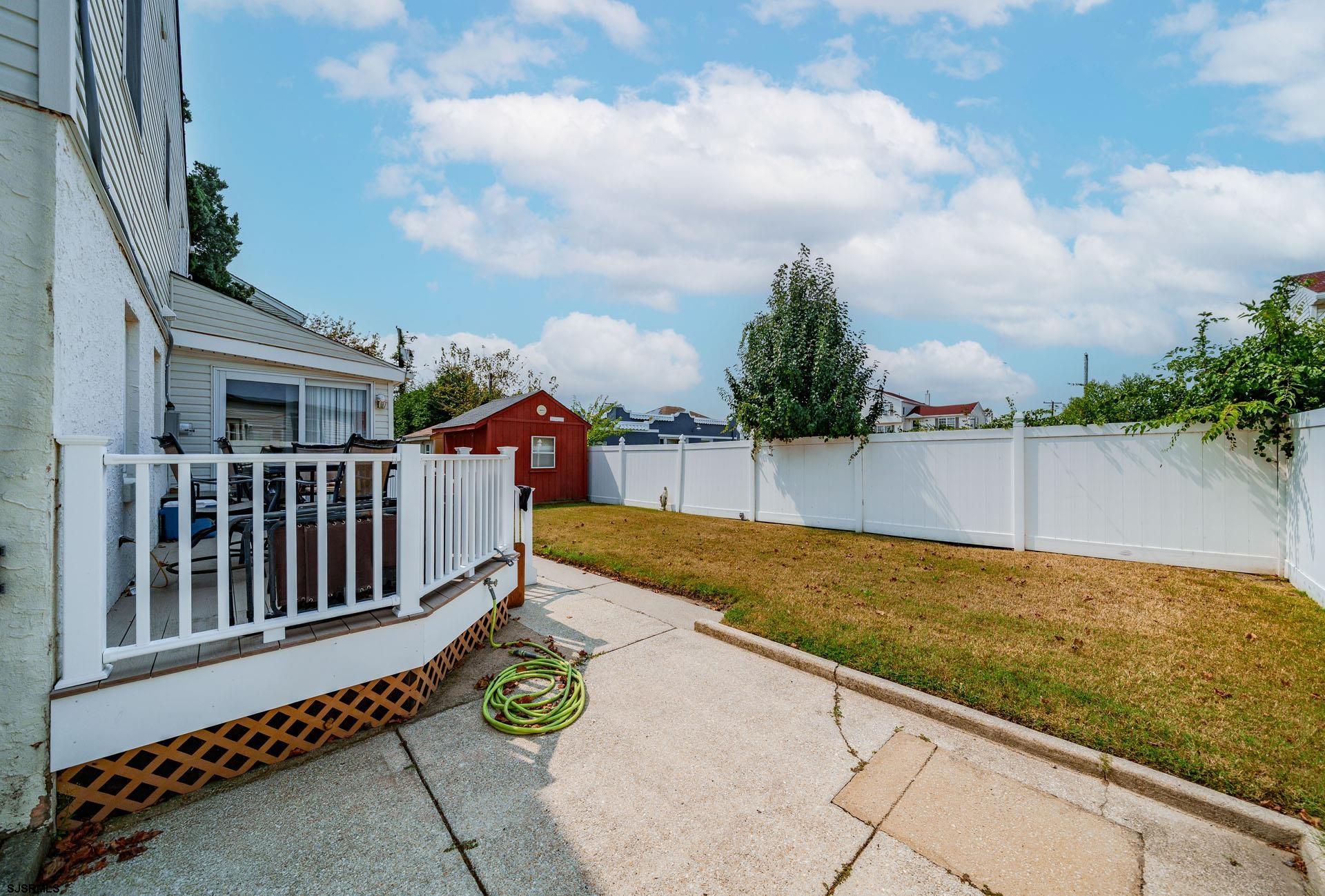 205 East Plaza Place Egg Harbor Township, NJ 08232 - Photo 28 of 31 a view of a backyard with sitting area