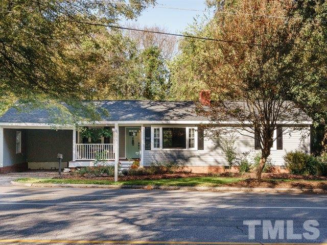 835 Brookside Drive Raleigh, NC 27604 - Photo 2 of 24 a front view of a house with a garden