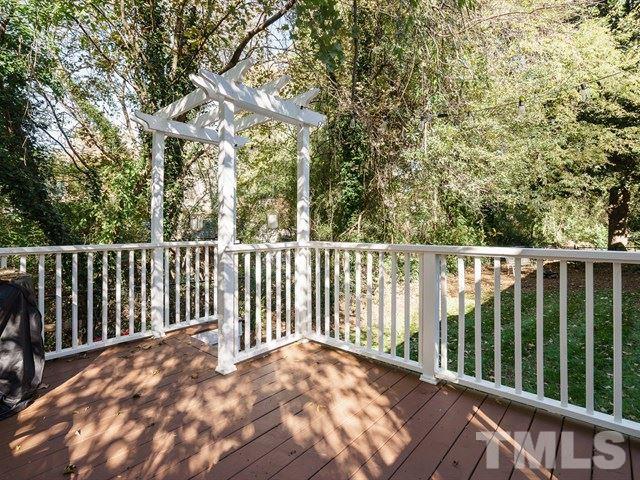 835 Brookside Drive Raleigh, NC 27604 - Photo 19 of 24 a view of a balcony with trees