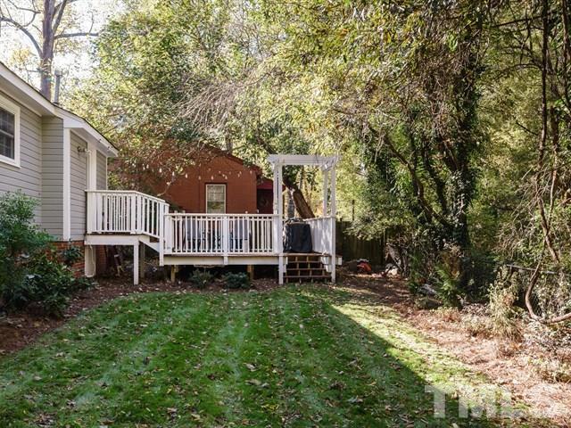 835 Brookside Drive Raleigh, NC 27604 - Photo 20 of 24 a view of a house with a yard and sitting area