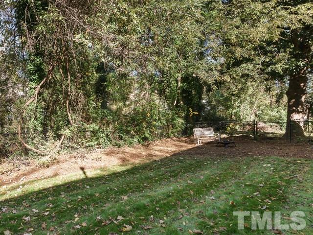835 Brookside Drive Raleigh, NC 27604 - Photo 21 of 24 a view of a yard with a tree