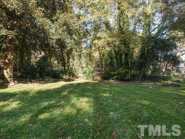 835 Brookside Drive Raleigh, NC 27604 - Photo 23 of 24 a view of outdoor space with deck and yard