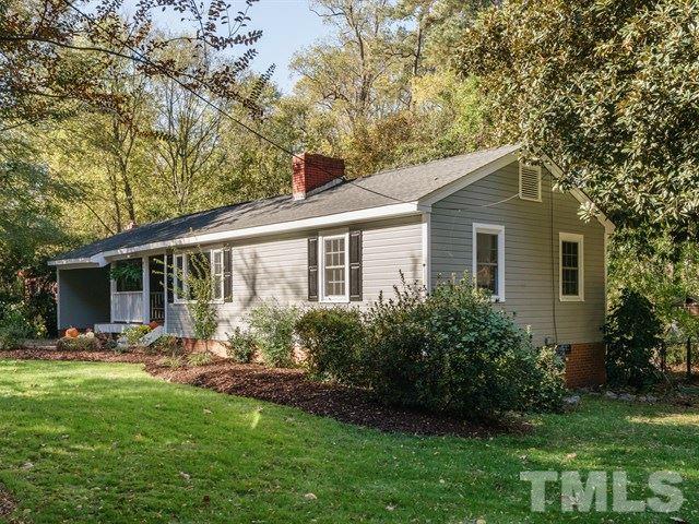 835 Brookside Drive Raleigh, NC 27604 - Photo 24 of 24 a front view of house with yard and green space