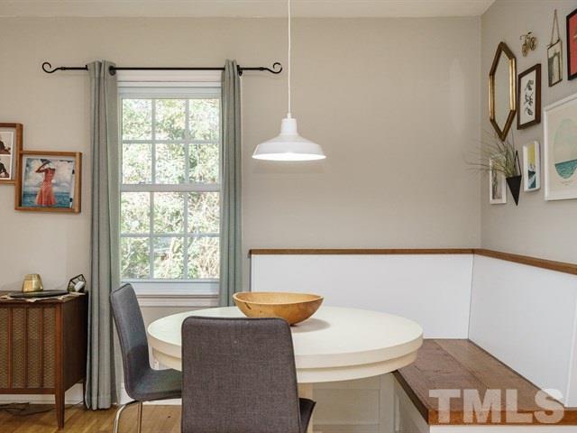 835 Brookside Drive Raleigh, NC 27604 - Photo 9 of 24 a bathroom with a sink a toilet and a window