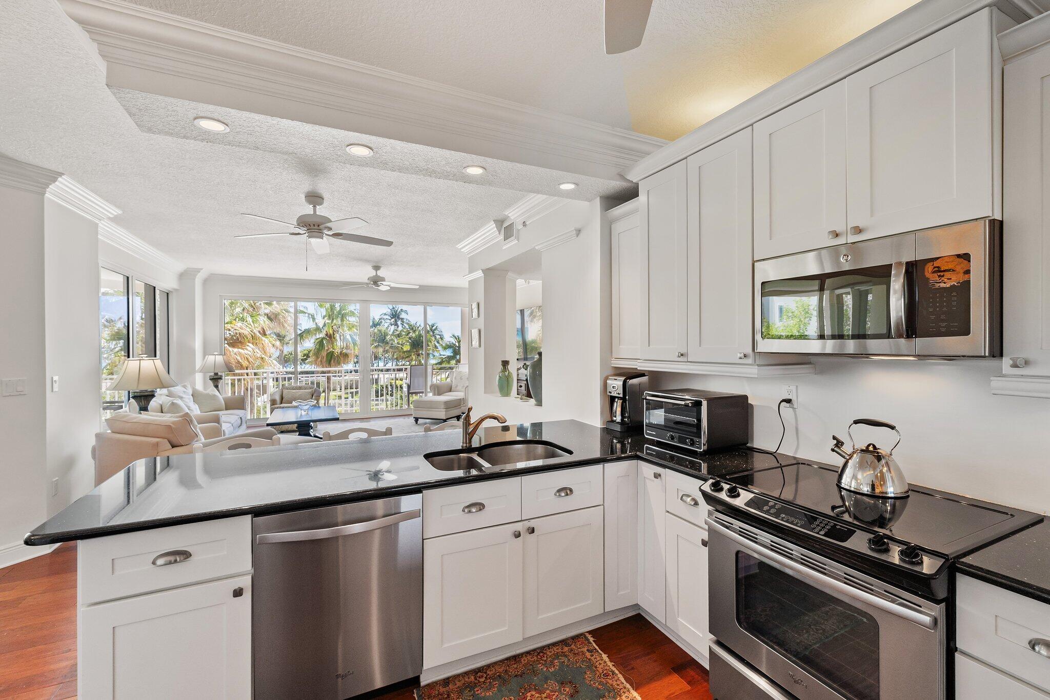 1660 Florida A1A, Unit 122 Jupiter, FL 33477 - Photo 9 of 21 jupiter-oceanfront-condo-kitchen-coastal