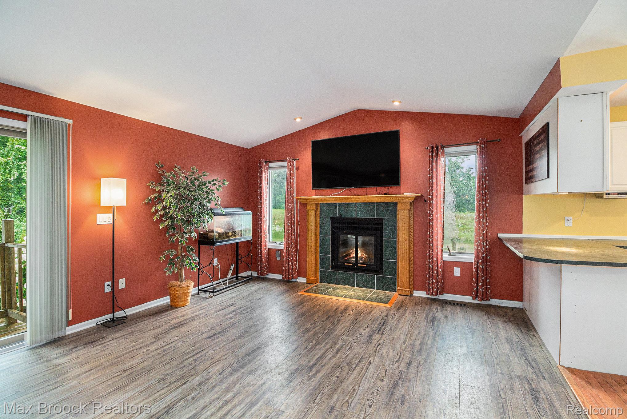 5096 Ridge Trail South Clarkston, MI 48348 - Photo 7 of 31 Beautiful Natural Fireplace with Sidelight Windows
