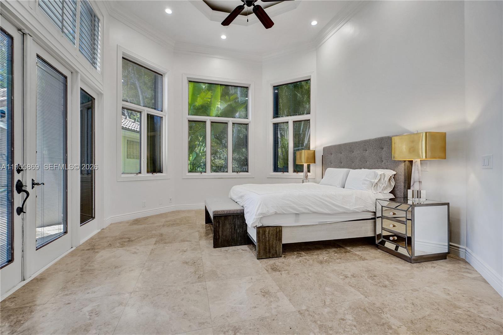 3175 Hunter Road Weston, FL 33331 - Photo 16 of 45 a bedroom with bed and window