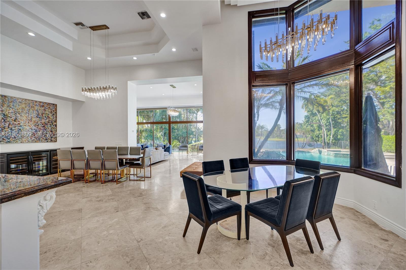 3175 Hunter Road Weston, FL 33331 - Photo 9 of 45 a dining room with furniture and a large window