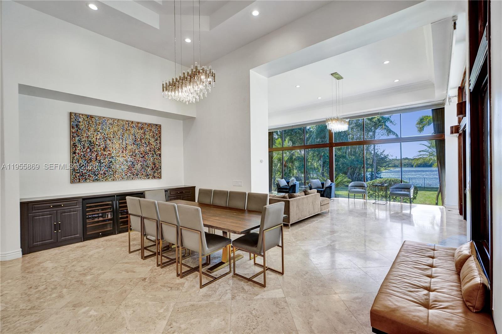 3175 Hunter Road Weston, FL 33331 - Photo 10 of 45 a living room with fireplace furniture and a large window