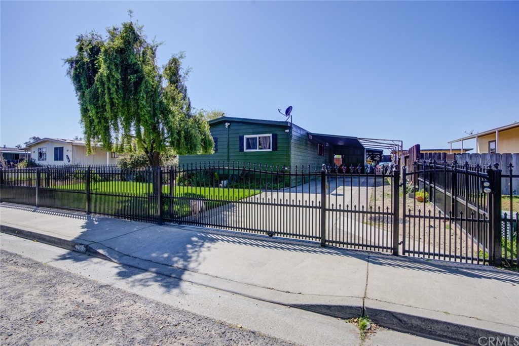 6289 Monica Way Winton, CA 95388 - Photo 1 of 1 a view of a backyard with a fence