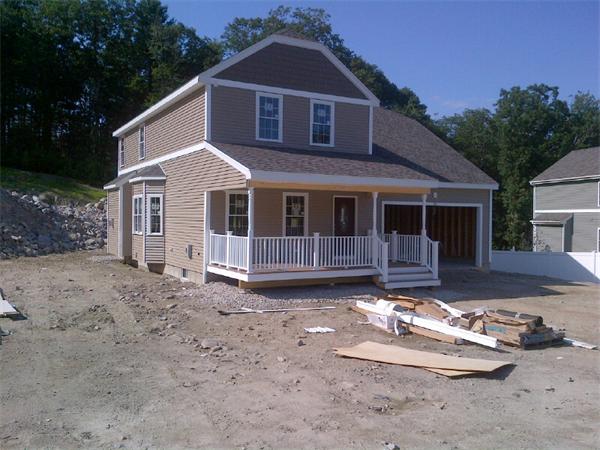55 Partridge Hill Road Sutton, MA 01590 - Photo 1 of 1 a view of a house with a yard in the background