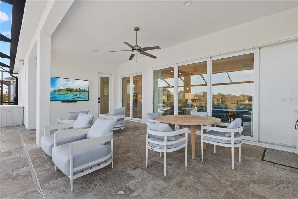 12480 Meribel Street Venice, FL 34293 - Photo 17 of 24 a living room with furniture and a large window