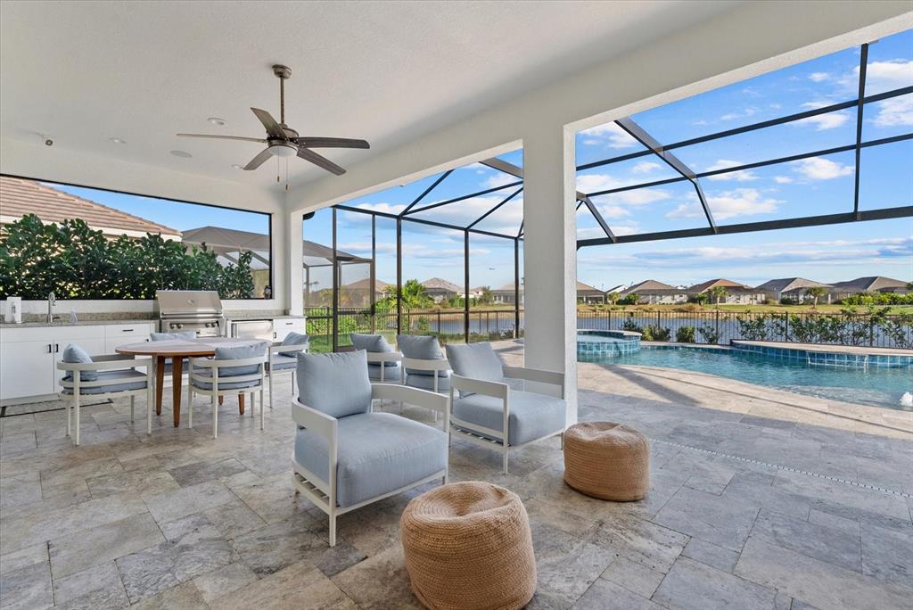 12480 Meribel Street Venice, FL 34293 - Photo 3 of 24 a living room with furniture and a large window