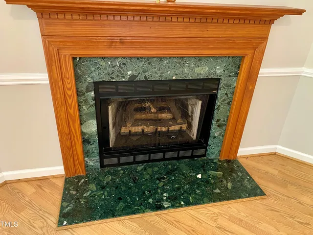 a living room with a fireplace