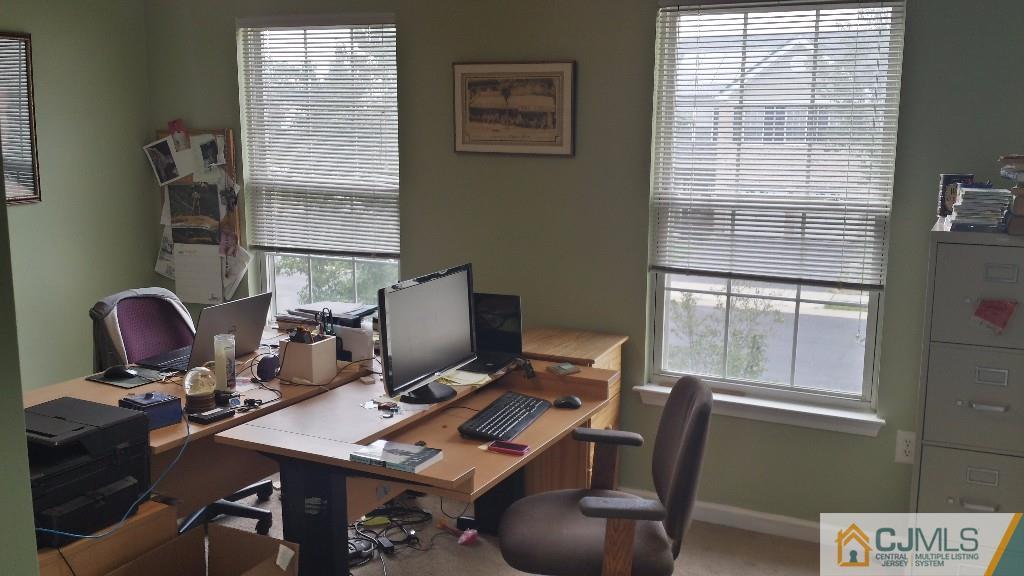 2 Brownstone Road East Windsor, NJ 08520 - Photo 16 of 18 a view of a workspace with furniture and a window