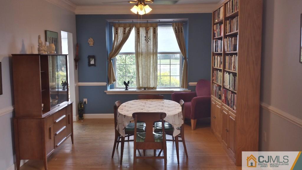 2 Brownstone Road East Windsor, NJ 08520 - Photo 5 of 18 a view of a dining room with furniture and window