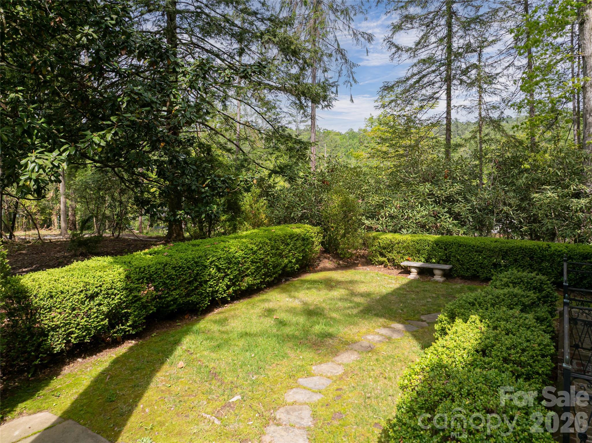 407 Vanderbilt Road Asheville, NC 28803 - Photo 18 of 48 a view of swimming pool from a garden