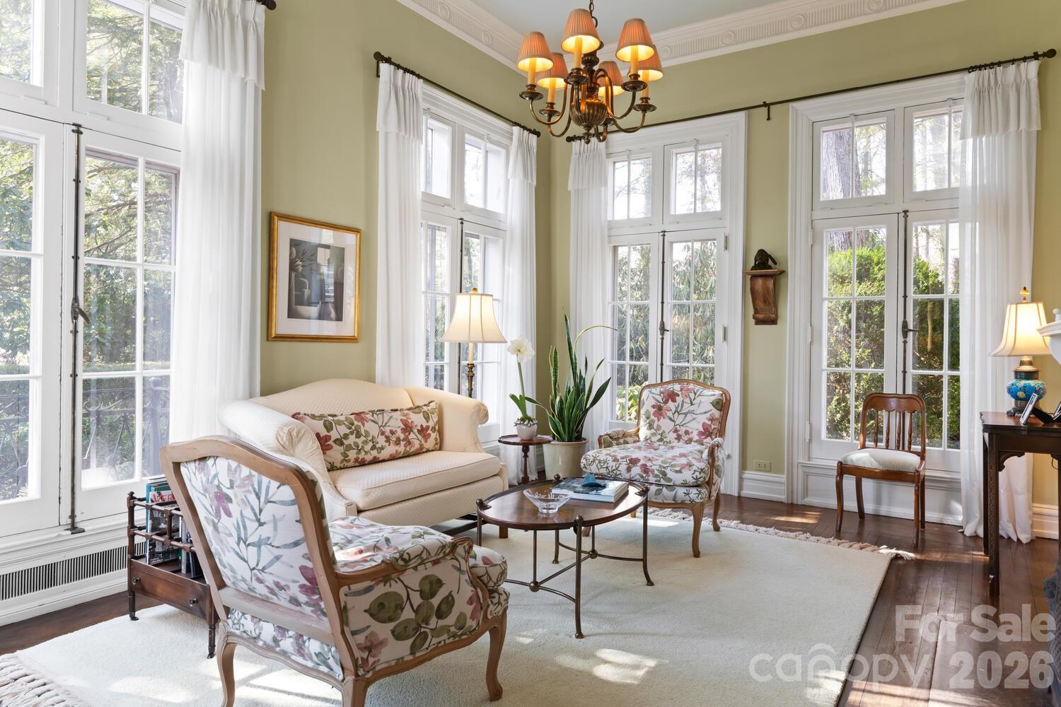 407 Vanderbilt Road Asheville, NC 28803 - Photo 20 of 48 a living room with furniture and a large window
